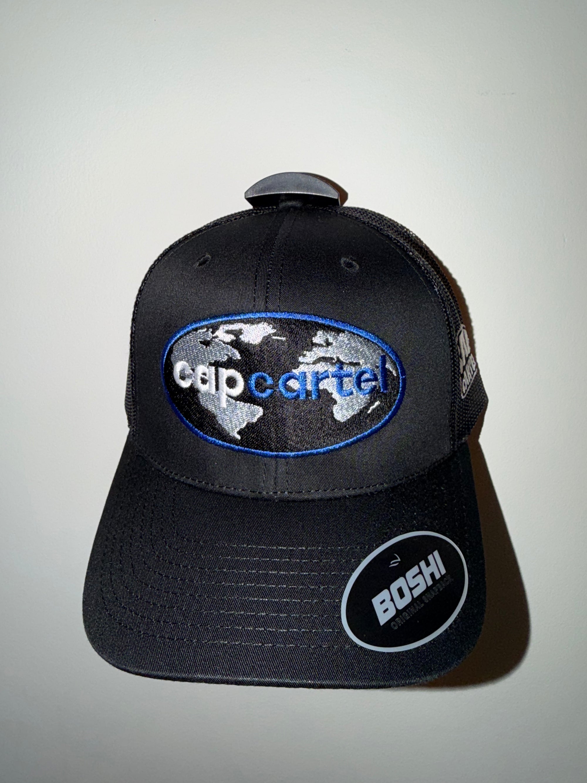 Capcartel world logo blue